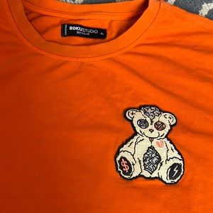 ROKU STUDIO RARE stuffed money bear Shirt - orange XL great condition!!